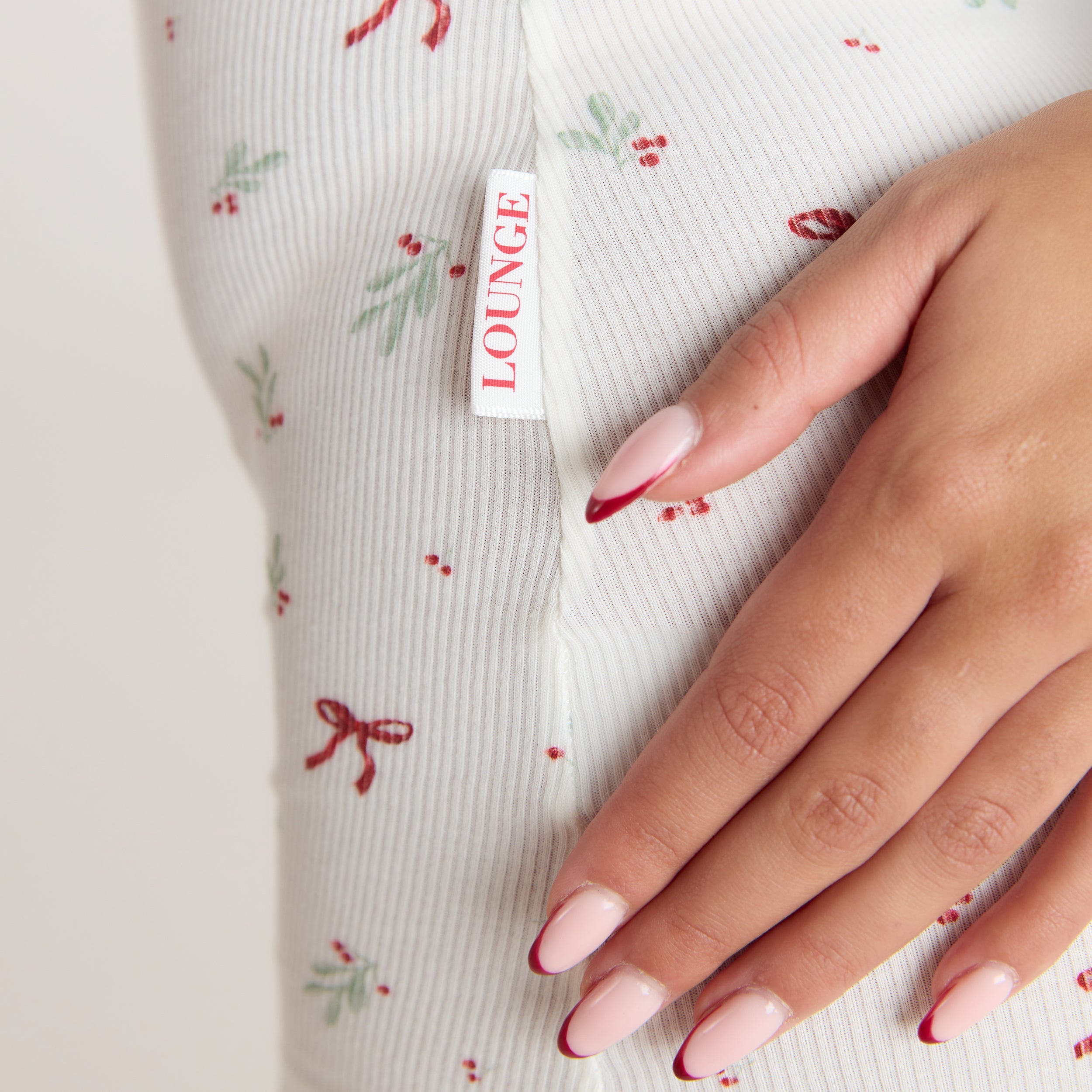 Mistletoe Gerippter Einteiler  | Mistletoe Gerippter Einteiler  - Schleife Muster